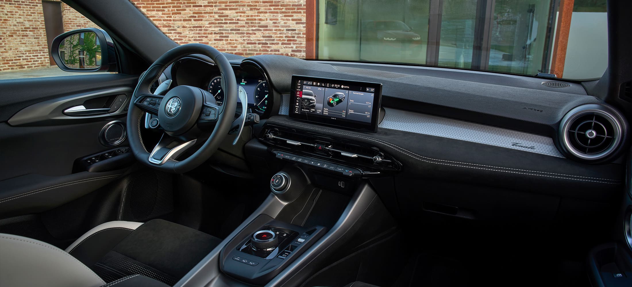 zu sehen ist das Lenkrad und das Interior des Alfa Romeo Tonale